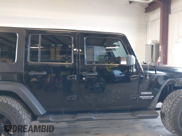 2012 Jeep Wrangler Unlimited Sport with VIN 1C4BJWDG8CL246829, listed as a IAAI auction lot 41816197 with 198,502 mi miles. Bid and sale history available at carsss.com. Image 14.