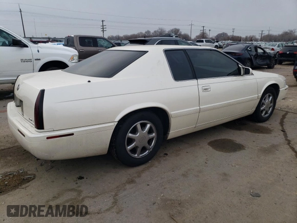 2001 Cadillac Eldorado Touring ETC z VIN 1G6ET12921B103685, wystawiony jako Copart lot #84565144 z przebiegiem 99 265 mil mil oraz Szkoda całkowita • Salvage title. Historia ofert i sprzedaży dostępna na DreamBid. Obrazek 3.