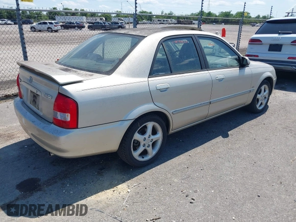2002 Mazda Protege DX with VIN JM1BJ225820568350, listed as a IAAI auction lot 42188364 with 52,572 mi miles and . Bid and sale history available at DreamBid. Image 4.