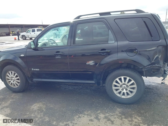 2009 Mercury Mariner Hybrid with VIN 4M2CU29319KJ18127, listed as a IAAI auction lot 41830660 with 273,438 mi miles. Bid and sale history available at carsss.com. Image 14.