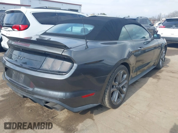 2019 Ford Mustang GT Premium z VIN 1FATP8FF2K5140520, wystawiony jako IAAI lot #41399442 z przebiegiem 101 737 mil mil oraz . Historia ofert i sprzedaży dostępna na DreamBid. Obrazek 4.