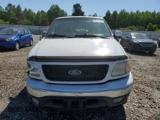 2001 Ford F-150 XL with VIN 1FTRF18L41NB60977, listed as a Copart auction lot 54933785 with 238,700 mi miles and Salvage title. Bid and sale history available at DreamBid. Image 5.