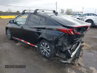 2020 Toyota Prius LE with VIN JTDKARFPXL3145838, listed as a IAAI auction lot 41936362 with 255,980 mi miles and . Bid and sale history available at DreamBid. Image 3.