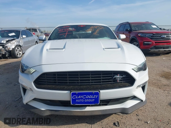 2021 Ford Mustang EcoBoost z VIN 1FA6P8TD5M5133239, wystawiony jako IAAI lot #41899042 z przebiegiem 65 553 mil mil oraz . Historia ofert i sprzedaży dostępna na DreamBid. Obrazek 12.