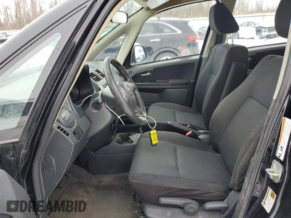 2013 Suzuki SX4 with VIN JS2YB5A44D6100218, listed as a Copart auction lot 43558615 with 165,025 mi miles and Salvage Title. Bid and sale history available at DreamBid. Image 7.