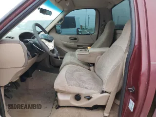 1999 Ford F-150 with VIN 1FTRF17W1XKB48291, listed as a Copart auction lot 45526035 with 154,699 mi miles and Salvage title. Bid and sale history available at DreamBid. Image 7.