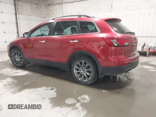 2015 Mazda CX-9 Grand Touring z VIN JM3TB3DAXF0464215, wystawiony jako IAAI lot #42043092 z przebiegiem 119 269 mil mil oraz . Historia ofert i sprzedaży dostępna na DreamBid. Obrazek 3.