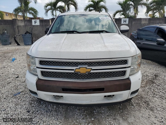 2012 Chevrolet Silverado 1500 LT with VIN 3GCPKSE74CG275882, listed as a Copart auction lot 52937825 with 168,389 mi miles and Salvage Title. Bid and sale history available at carsss.com. Image 5.