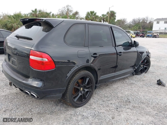 2009 Porsche Cayenne GTS with VIN WP1AD29P99LA62818, listed as a IAAI auction lot 41627073 with 166,414 mi miles. Bid and sale history available at carsss.com. Image 4.