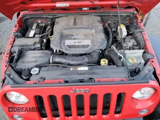2015 Jeep Wrangler Willys Wheeler with VIN 1C4AJWAG9FL543998, listed as a Copart auction lot 88947025 with 142,433 mi miles and Salvage title. Bid and sale history available at DreamBid. Image 12.