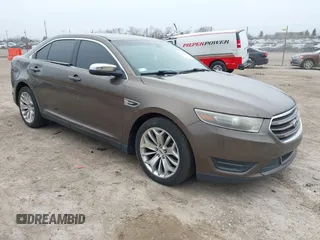 2015 Ford Taurus Limited with VIN 1FAHP2J84FG110702, listed as a IAAI auction lot 42060437 with 208,012 mi miles. Bid and sale history available at carsss.com. Image 1.