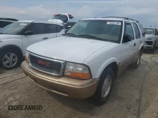 2000 GMC Jimmy SL with VIN 1GKCS13W4Y2106047, listed as a Copart auction lot 75257184 with 73,571 mi miles and Non Repairable. Bid and sale history available at carsss.com. Image 1.