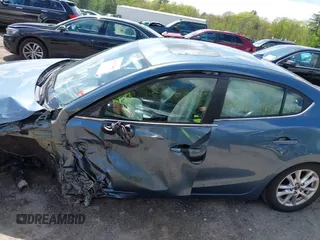 2015 Mazda 3 i Touring with VIN 3MZBM1V7XFM234786, listed as a IAAI auction lot 42277481 with 65,297 mi miles and . Bid and sale history available at DreamBid. Image 14.