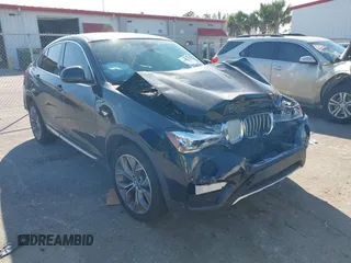 2018 BMW X4 xDrive28i with VIN 5UXXW3C55J0T82497, listed as a IAAI auction lot 41023429 with 113,018 mi miles and . Bid and sale history available at DreamBid. Image 1.