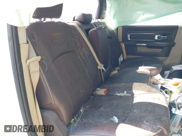 2013 Ram 2500 Laramie Longhorn with VIN 3C6UR5LL7DG522840, listed as a IAAI auction lot 41970385 with 145,144 mi miles and . Bid and sale history available at DreamBid. Image 8.