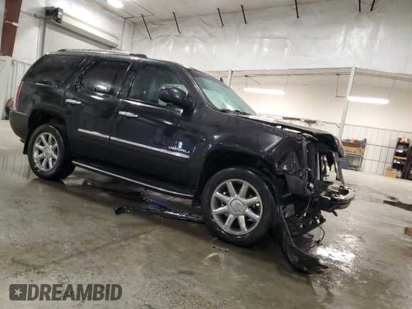 2013 GMC Yukon Denali with VIN 1GKS2EEF0DR283857, listed as a Copart auction lot 46505705 with 148,428 mi miles and Salvage Title. Bid and sale history available at carsss.com. Image 4.