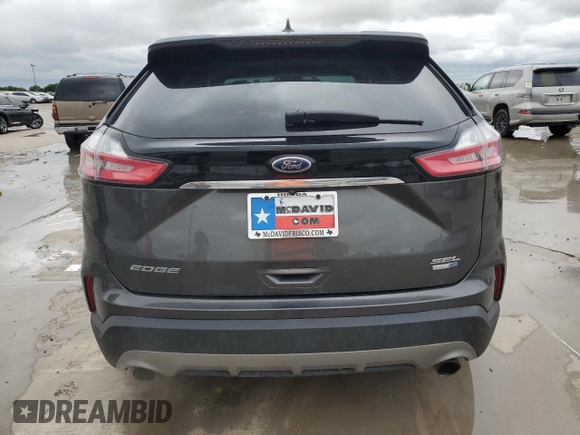 2019 Ford Edge SEL z VIN 2FMPK4J92KBB21770, wystawiony jako Copart lot #56056585 z przebiegiem 64 042 mil mil oraz Szkoda całkowita • Salvage title. Historia ofert i sprzedaży dostępna na DreamBid. Obrazek 6.