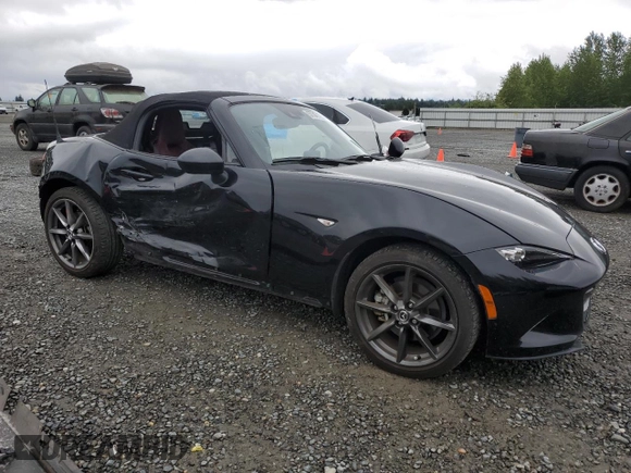 2021 Mazda MX-5 Miata Grand Touring with VIN JM1NDAD78M0455899, listed as a Copart auction lot 57347125 with 38,405 mi miles and Salvage title. Bid and sale history available at DreamBid. Image 4.