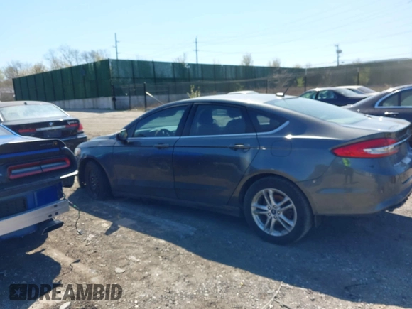 2018 Ford Fusion SE z VIN 3FA6P0H74JR233829, wystawiony jako IAAI lot #42049766 z przebiegiem 120 370 mil mil oraz . Historia ofert i sprzedaży dostępna na DreamBid. Obrazek 14.