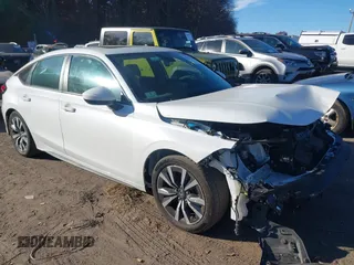 2023 Honda Civic EX-L z VIN 19XFL1H75PE015183, wystawiony jako IAAI lot #40850194 z przebiegiem 47 670 mil mil oraz . Historia ofert i sprzedaży dostępna na DreamBid. Obrazek 1.
