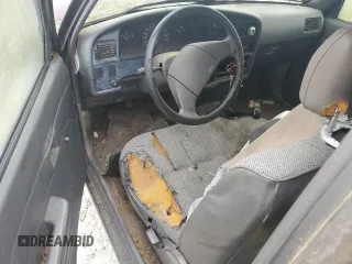 1989 Toyota Pickup DLX z VIN JT4RN93P5K0008068, wystawiony jako Copart lot #58843695 z przebiegiem 285 895 mil mil oraz Tytuł czysty. Historia ofert i sprzedaży dostępna na DreamBid. Obrazek 8.