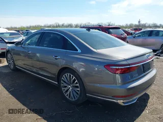2019 Audi A8 with VIN WAU8DAF82KN004287, listed as a IAAI auction lot 41962495 with 65,053 mi miles and . Bid and sale history available at DreamBid. Image 3.