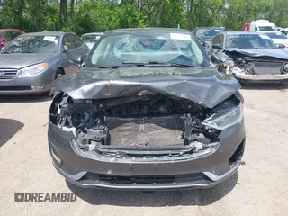 2020 Ford Fusion Titanium with VIN 3FA6P0RUXLR182120, listed as a IAAI auction lot 42351542 with 141,746 mi miles and . Bid and sale history available at DreamBid. Image 12.