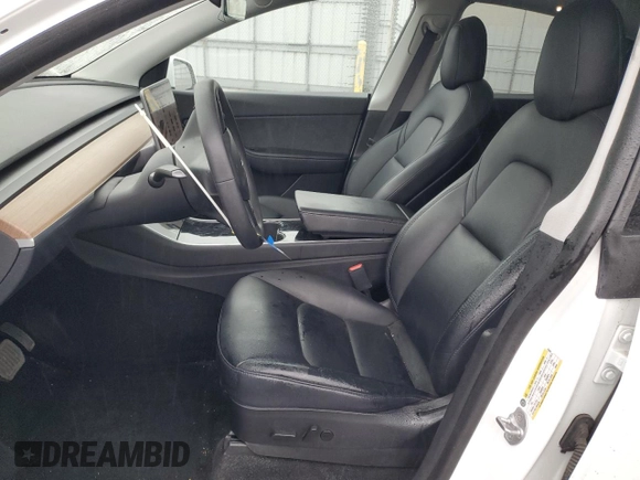 2020 Tesla Model Y Long Range with VIN 5YJYGDEE5LF053938, listed as a Copart auction lot 43381985 with 69,291 mi miles and Salvage Title. Bid and sale history available at DreamBid. Image 7.