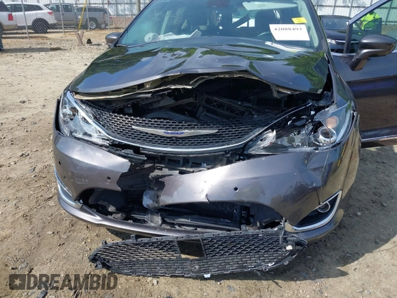 2020 Chrysler Pacifica Touring L Plus z VIN 2C4RC1EG5LR203664, wystawiony jako IAAI lot #42088493 z przebiegiem 104 745 mil mil oraz . Historia ofert i sprzedaży dostępna na DreamBid. Obrazek 6.