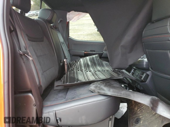 2023 Ford F-150 Raptor with VIN 1FTFW1RJ0PFC92699, listed as a Copart auction lot 83548604 with Not Provided miles and Salvage Title. Bid and sale history available at DreamBid. Image 11.