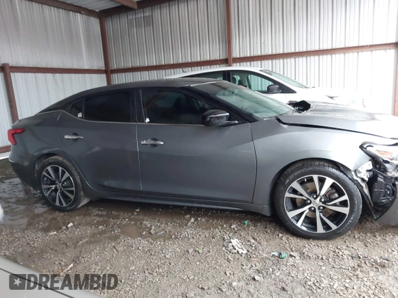 2018 Nissan Maxima Platinum z VIN 1N4AA6AP4JC390235, wystawiony jako IAAI lot #42376364 z przebiegiem 152 293 mil mil oraz . Historia ofert i sprzedaży dostępna na DreamBid. Obrazek 13.