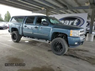 2011 Chevrolet Silverado 1500 LT with VIN 3GCPKSE3XBG378106, listed as a Copart auction lot 54523865 with 135,895 mi miles and Salvage Title. Bid and sale history available at DreamBid. Image 4.