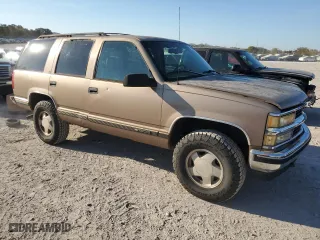1996 Chevrolet Tahoe with VIN 1GNEK13R1TJ385350, listed as a Copart auction lot 77593884 with 169,178 mi miles and Salvage Title. Bid and sale history available at carsss.com. Image 4.