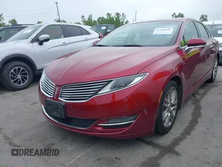 2015 Lincoln MKZ z VIN 3LN6L2GK3FR622116, wystawiony jako IAAI lot #42308692 z przebiegiem 126 047 mil mil oraz . Historia ofert i sprzedaży dostępna na DreamBid. Obrazek 6.