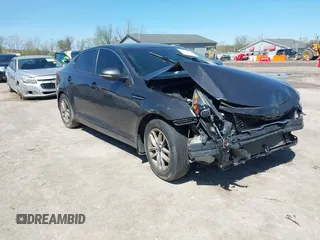 2011 Kia Optima LX with VIN KNAGM4A71B5061995, listed as a IAAI auction lot 42129683 with 207,110 mi miles and . Bid and sale history available at carsss.com. Image 1.