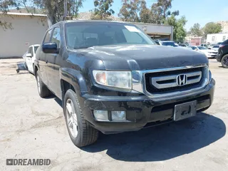 2011 Honda Ridgeline RTL with VIN 5FPYK1F50BB001442, listed as a IAAI auction lot 42023615 with 189,170 mi miles. Bid and sale history available at carsss.com. Image 6.