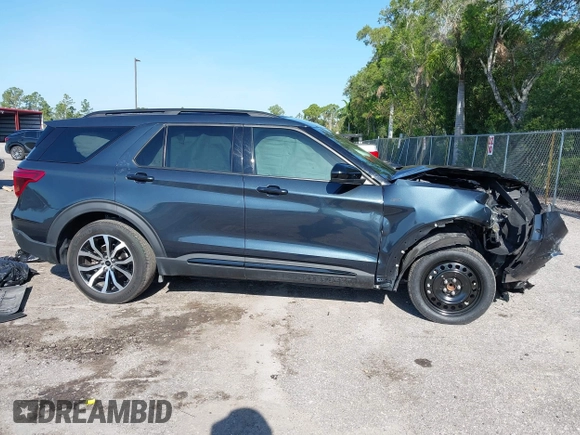 2022 Ford Explorer ST-Line z VIN 1FMSK7KH9NGB68860, wystawiony jako IAAI lot #42287420 z przebiegiem 25 579 mil mil oraz . Historia ofert i sprzedaży dostępna na DreamBid. Obrazek 14.