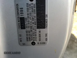 1986 Toyota Tercel z VIN JT2AL31G5G0429131, wystawiony jako Copart lot #79204554 z przebiegiem 124 477 mil mil oraz Szkoda całkowita • Salvage title. Historia ofert i sprzedaży dostępna na DreamBid. Obrazek 12.