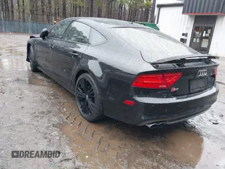 2014 Audi S7 Prestige with VIN WAUW2AFCXEN105101, listed as a IAAI auction lot 41562793 with 1 mi miles. Bid and sale history available at carsss.com. Image 3.
