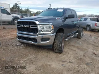 2020 Ram 2500 Tradesman with VIN 3C6UR5CL9LG123989, listed as a IAAI auction lot 41226509 with 144,018 mi miles. Bid and sale history available at carsss.com. Image 2.