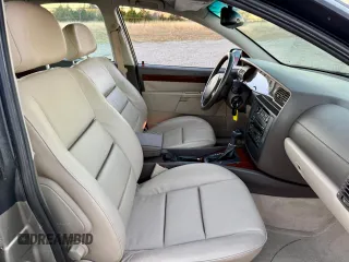 2001 Cadillac Catera z VIN W06VR54R01R009345, wystawiony jako Copart lot #80393534 z przebiegiem 43 757 mil mil oraz Tytuł czysty. Historia ofert i sprzedaży dostępna na DreamBid. Obrazek 5.