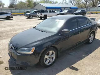 2013 Volkswagen Jetta TDI w/Premium with VIN 3VWLL7AJ2DM203752, listed as a Copart auction lot 52490645 with 189,888 mi miles and Clean title. Bid and sale history available at DreamBid. Image 1.