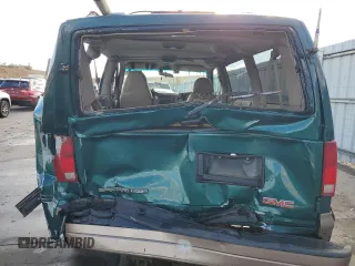2003 GMC Safari with VIN 1GKEL19X83B512525, listed as a Copart auction lot 79059984 with 122,800 mi miles and Salvage Title. Bid and sale history available at carsss.com. Image 6.