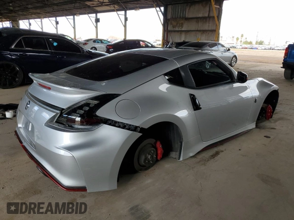2015 Nissan 370Z Nismo z VIN JN1AZ4EH1FM441060, wystawiony jako Copart lot #53423725 z przebiegiem Nie podano mil oraz Szkoda całkowita • Salvage title. Historia ofert i sprzedaży dostępna na DreamBid. Obrazek 3.