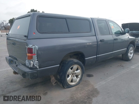 2002 Dodge 1500 with VIN 1D7HU18Z92J187015, listed as a IAAI auction lot 41602643 with 198,944 mi miles and . Bid and sale history available at DreamBid. Image 4.