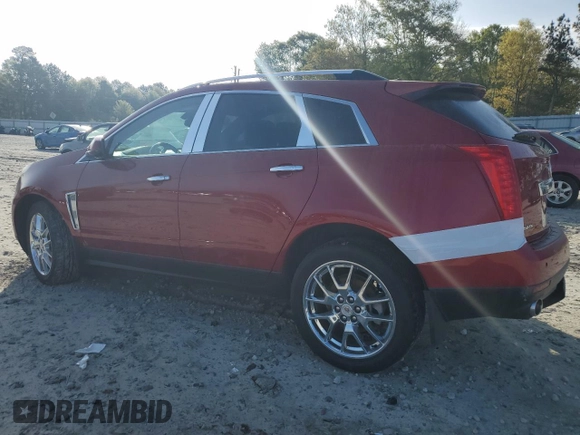 2013 Cadillac SRX Performance Collection with VIN 3GYFNDE33DS634241, listed as a Copart auction lot 51799355 with 111,583 mi miles and Salvage Title. Bid and sale history available at DreamBid. Image 2.