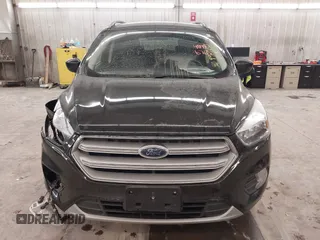 2018 Ford Escape SE z VIN 1FMCU9GD0JUC25636, wystawiony jako IAAI lot #40996760 z przebiegiem 70 097 mil mil oraz . Historia ofert i sprzedaży dostępna na DreamBid. Obrazek 13.