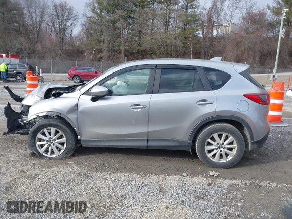 2013 Mazda CX-5 Touring with VIN JM3KE2CE9D0133348, listed as a IAAI auction lot 41357592 with 122,227 mi miles. Bid and sale history available at carsss.com. Image 13.