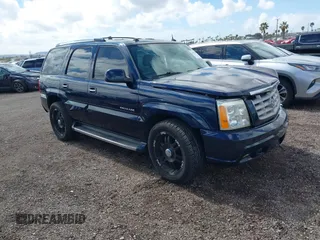 2004 Cadillac Escalade z VIN 1GYEC63T34R273497, wystawiony jako IAAI lot #41719537 z przebiegiem 256 975 mil mil oraz . Historia ofert i sprzedaży dostępna na DreamBid. Obrazek 1.