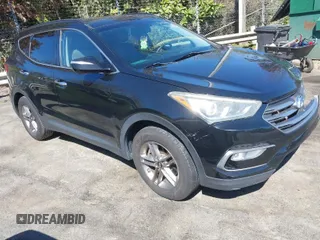 2017 Hyundai Santa Fe 2.4L z VIN 5NMZUDLB8HH031962, wystawiony jako IAAI lot #41862133 z przebiegiem 97 594 mil mil oraz . Historia ofert i sprzedaży dostępna na DreamBid. Obrazek 1.
